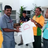 Chairman Kamaraj handing over TPSOH T Shirts to TITAN Volunteers in the presence of President Selvakumar & Udayakumar chairman Information & Publicity